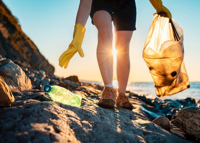 Picking up plastic waste on an Australian beach