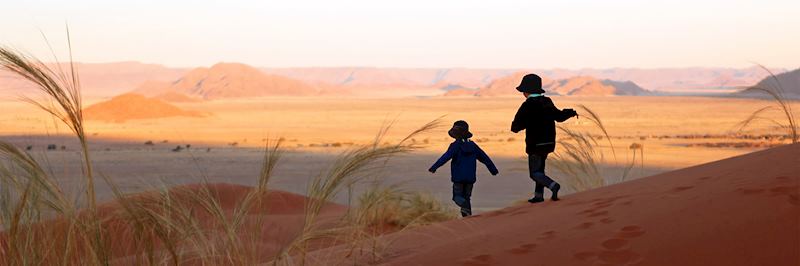 Children exploring the sand dunes of Sossusvlei