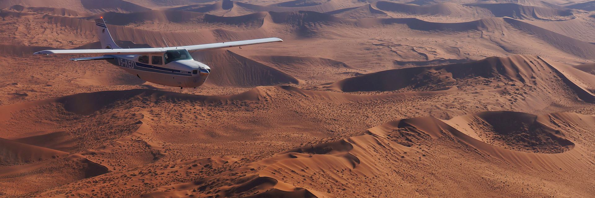 Light aircraft over the Namib Desert