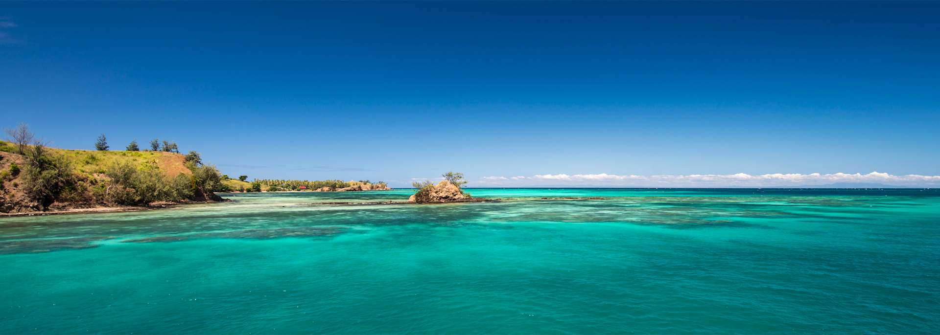 White sand beach and clear sea, Fiji