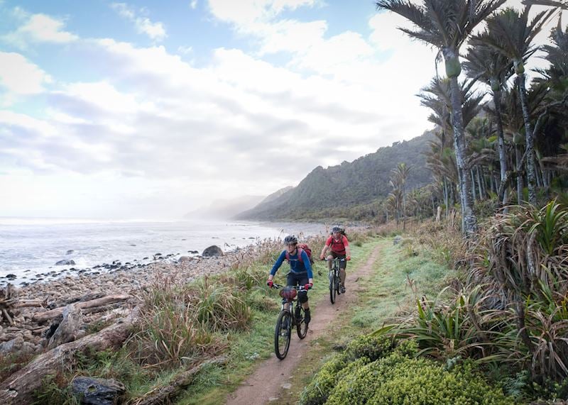Mountain biking on the coast of Kahurangi National Park