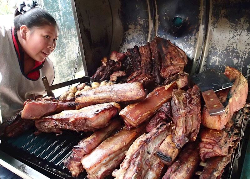 Try a Peruvian hog roast while it's hot