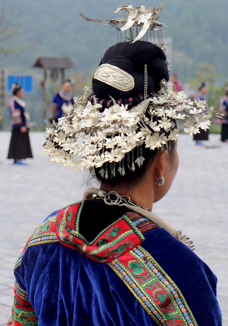 The Miao have been creating intricate silver headdresses and necklaces for centuries
