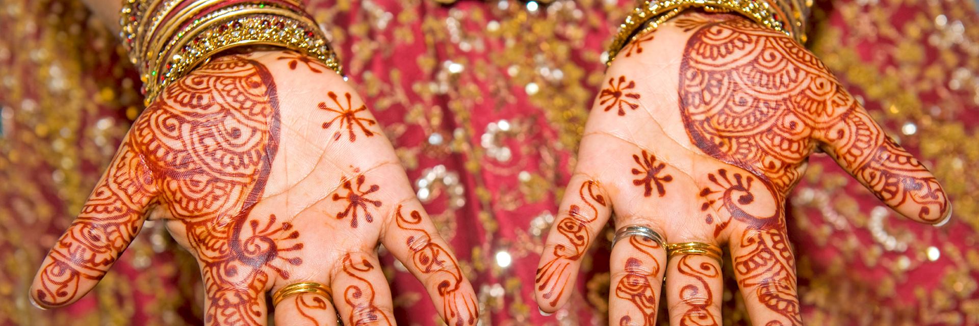 Indian lady's hands covered in henna