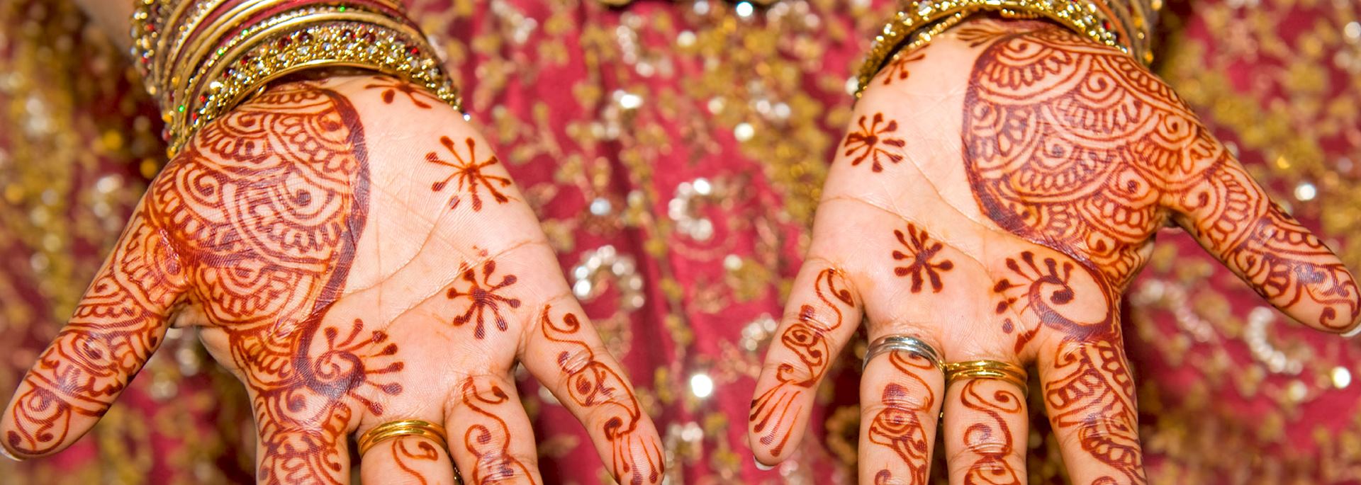 Indian lady's hands covered in henna