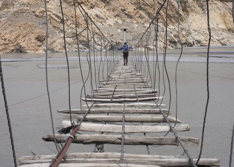 The hanging bridge of Passu, one of the few old rope bridges that survived the recent heavy flooding of the Hunza River