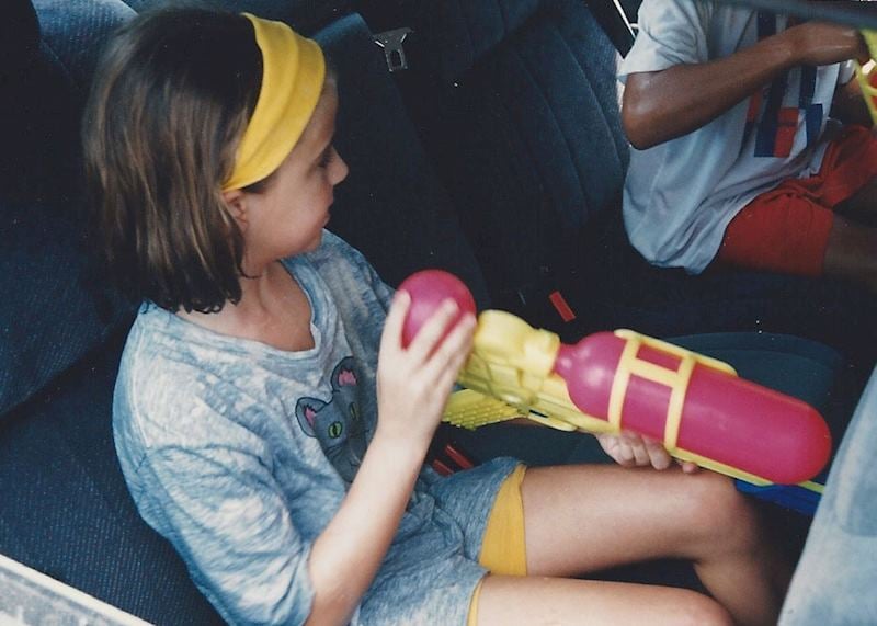 Molly aged 7, driving around the neighbourhoods of Nonthaburi
