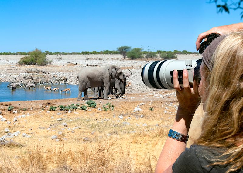 Photographer on safari in Africa