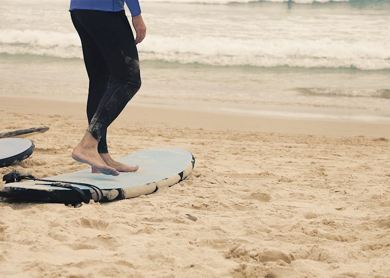 Surfer practising on the beach