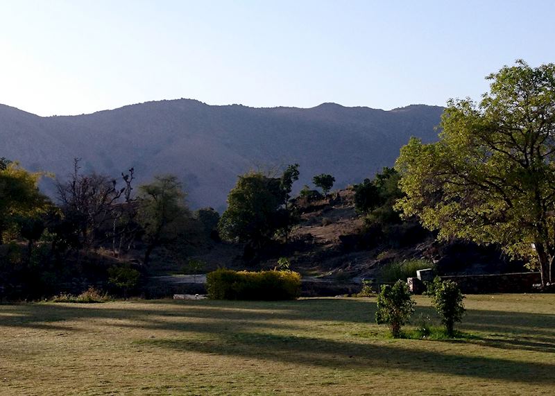 The lawn and lake outside the breakfast area at Araveli