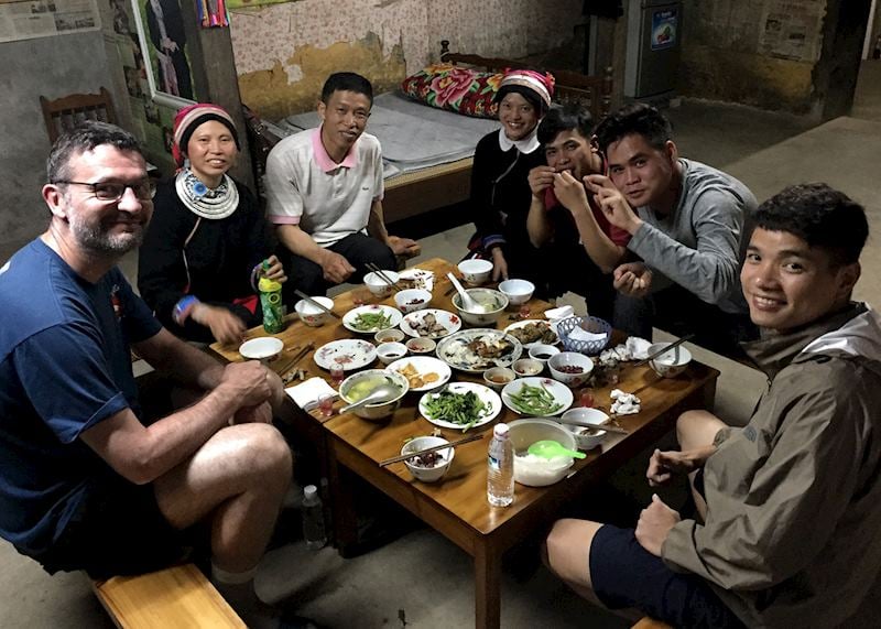 Alex in Nam Dam village with members of the Dao tribe, Vietnam