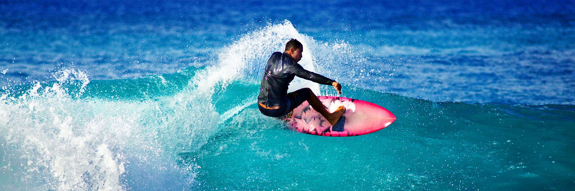 Surfer off the coast of Hawaii