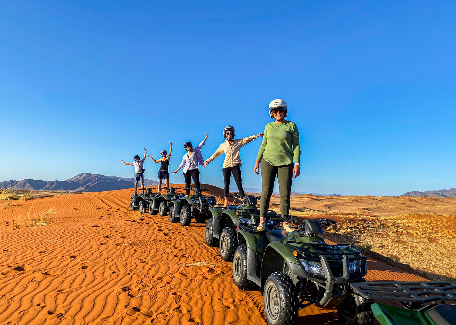 Audley country specialists on quad bikes in desert