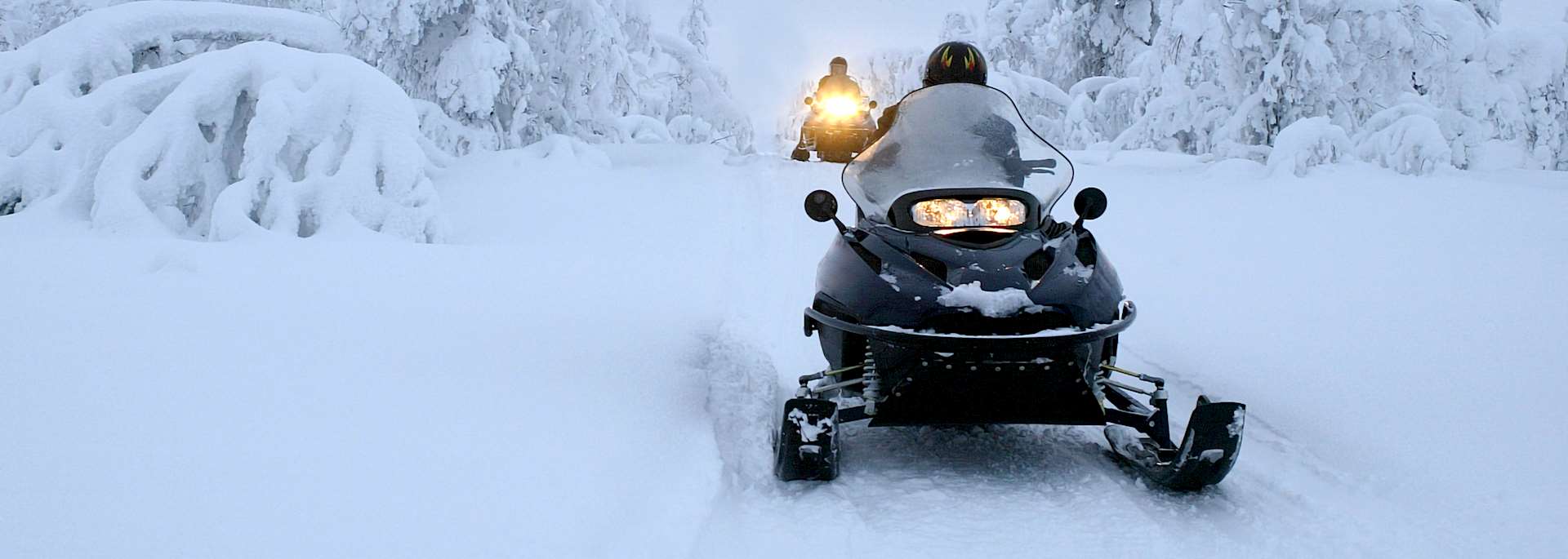 Exploring by snowmobile, Finnish Lapland