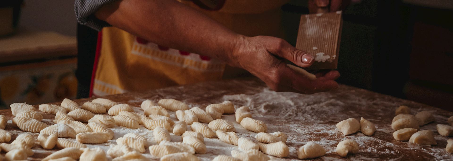 Woman preparing gnocchi