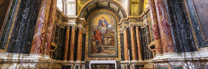 The richly decorated interior of Santa Maria del Popolo church, Rome