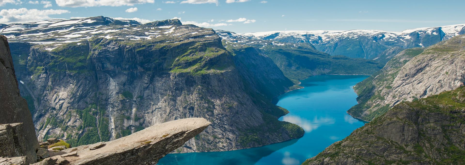 The rock formation of Trolltunga above lake Ringedalsvatnet