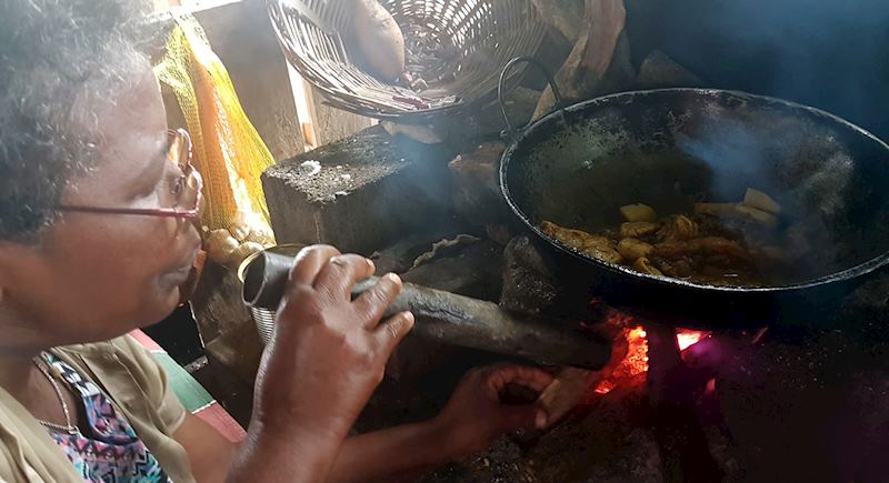 Marie-Michelle preparing Creole food
