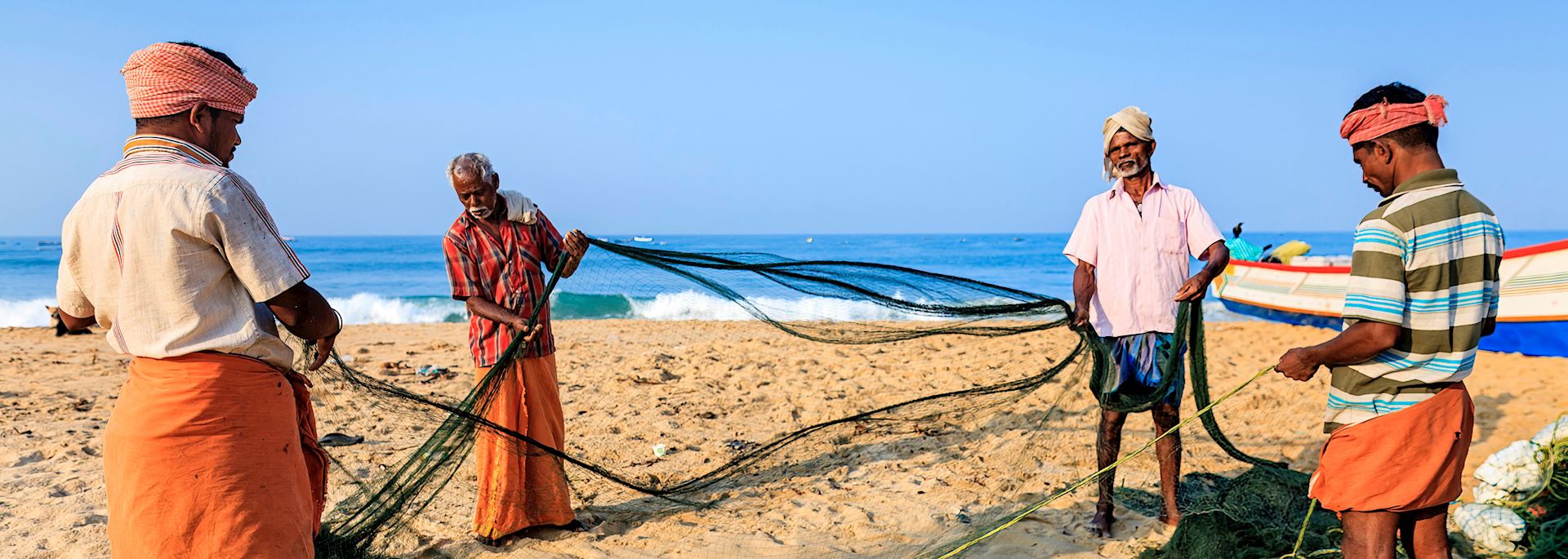 Fishermen on the beach in Cochin, Kerala