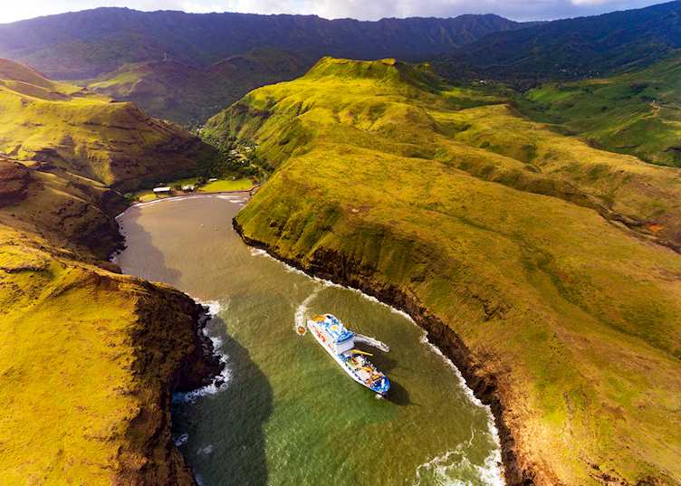 Aranui 5 cruising off Ua Huka in the Marquesas Islands, French Polynesia