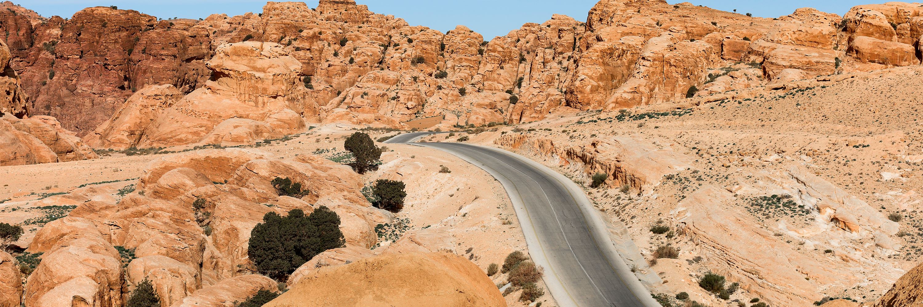 https://media.audleytravel.com/-/media/images/home/north-africa-and-the-middle-east/jordan/travel-guides/the-kings-highway-in-jordan/istock_1124394076_kings_highway_jordan_8008049_3000x1000.jpg