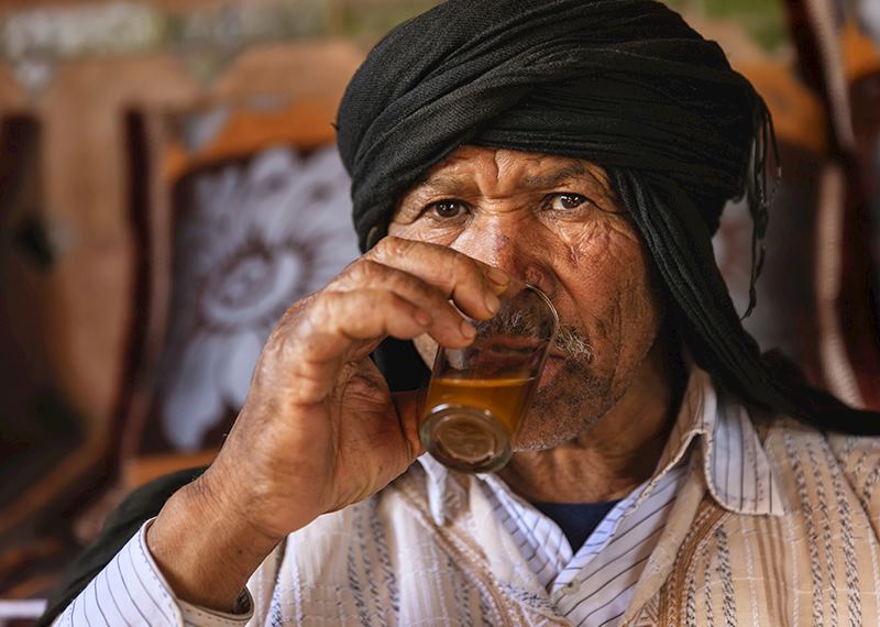 Moroccan man drinking mint tea