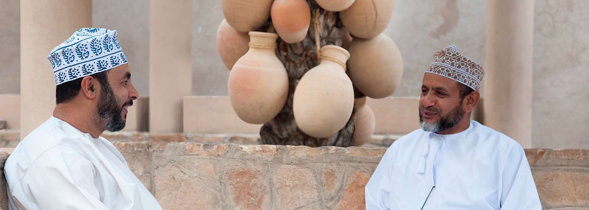 Local men chatting in Nizwa