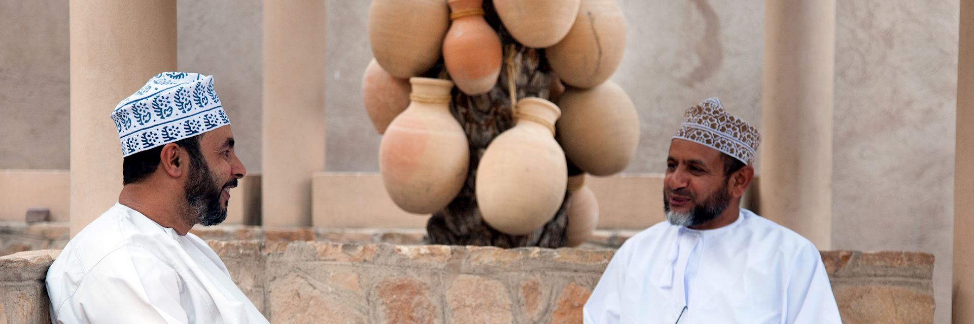 Local men chatting in Nizwa