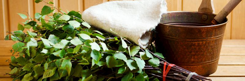 Banya (bathhouse and sauna): birch leaves and hair cap