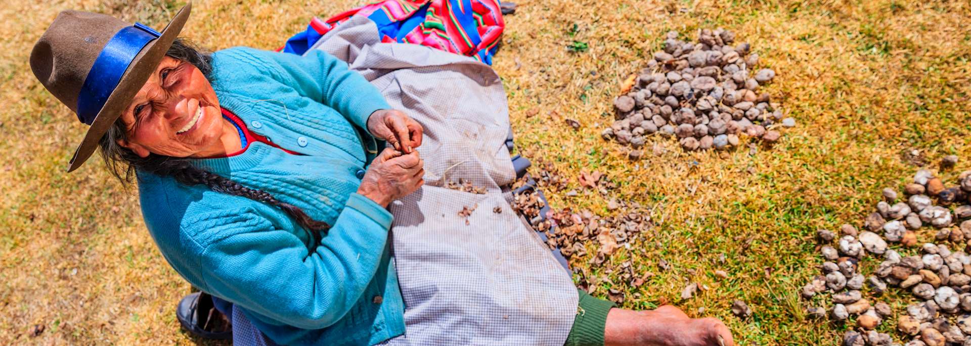 Peruvian woman preparing chuño