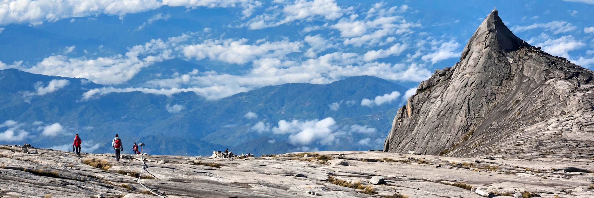 Mount Kinabalu can be climbed with the aid of an experienced guide
