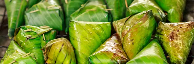 Sticky rice wrapped in banana leaves