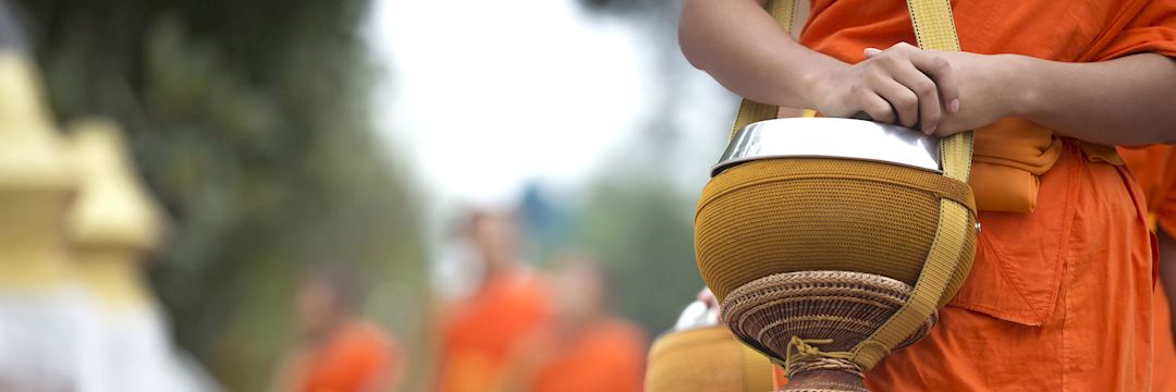 Alms giving by Buddhist monks in Luang Prabang