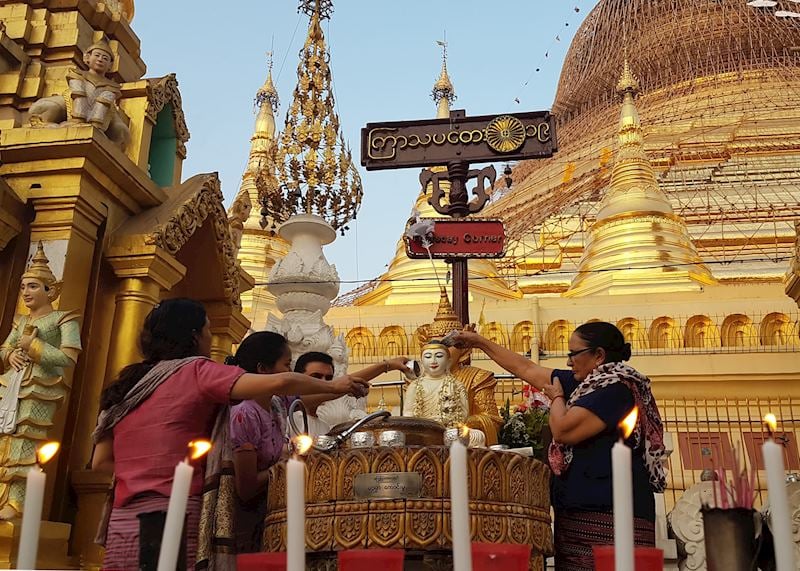 Locals at a temple in Yangon