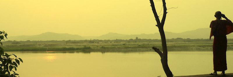 A monk on the banks of the Ayeyarwady River