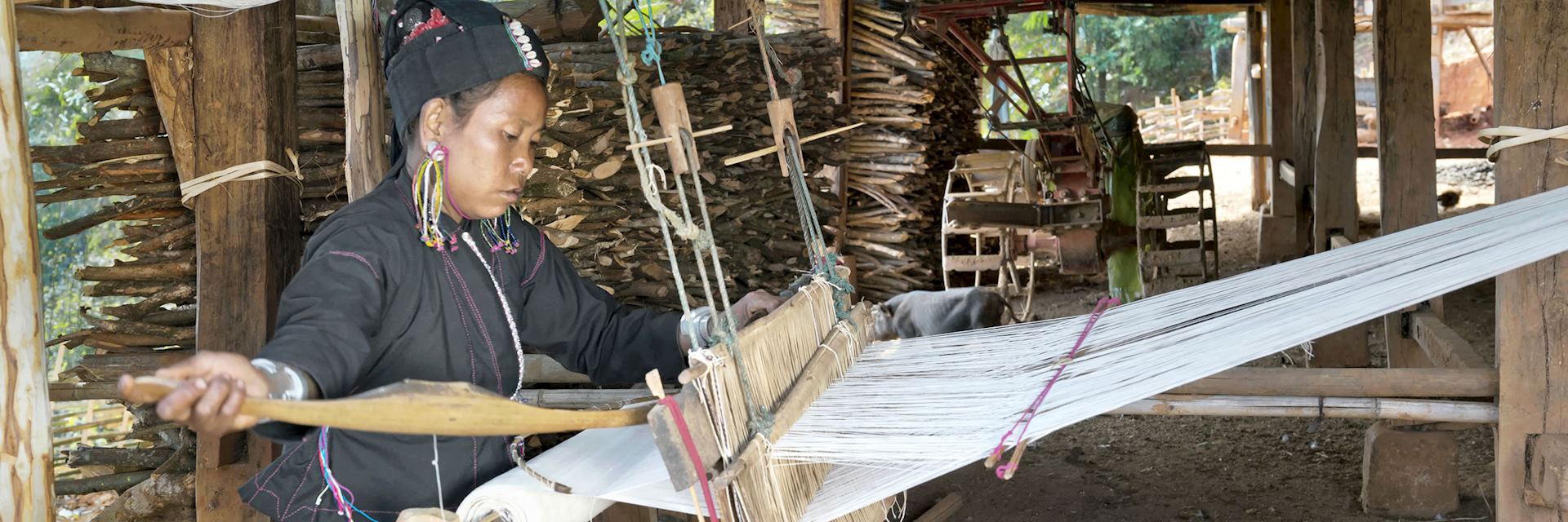 An tribe woman weaving cotton, Burma