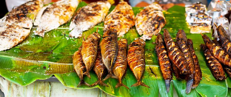 Grilled fish on banana leaves