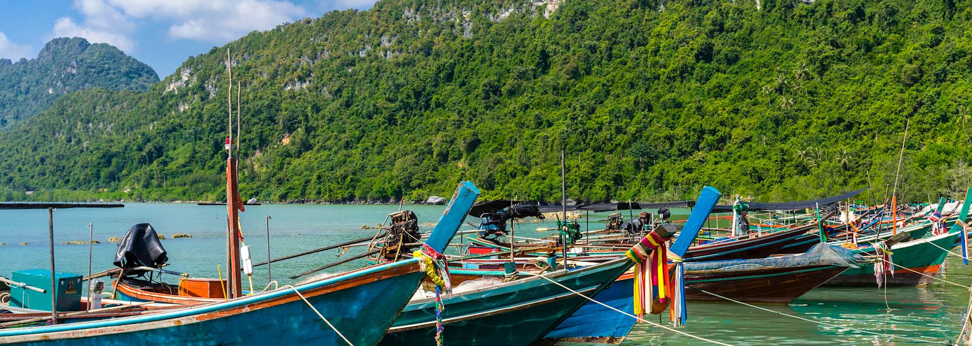 Long-tail boats docked at Khanom beach