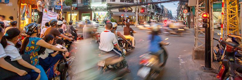 Take a street food tour on a Vespa in Ho Chi Minh City