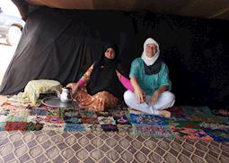 Brigitte taking tea in a Bedouin tent, Morocco