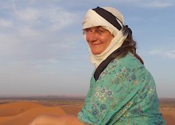 Brigitte visiting the desert in Morocco