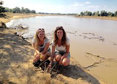 Harriet and Audley colleague on the banks of the Luangwa River, Zambia