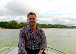 Pete on a boat trip along the Rufiji River, Tanzania