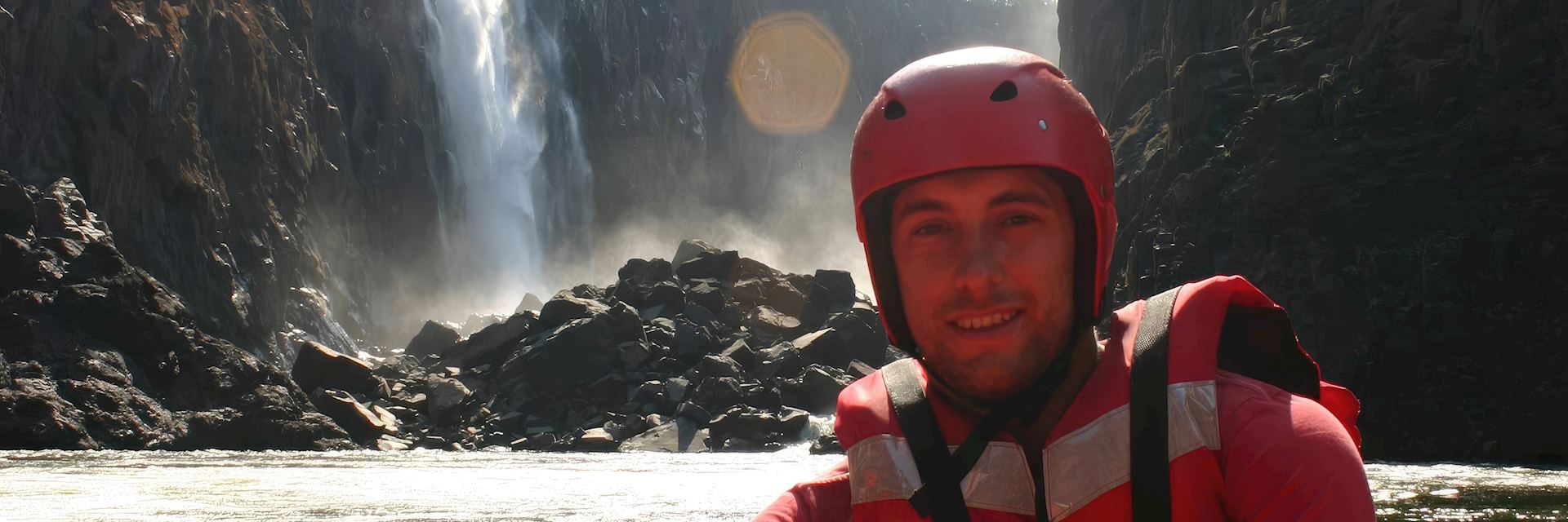 Russell at the foot of Victoria Falls, Zambia