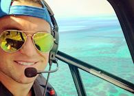 Tom on a helicopter flight in Mozambique