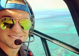 Tom on a helicopter flight in Mozambique
