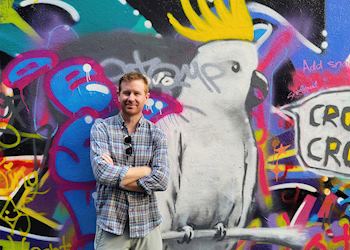 Matt with street art in Melbourne, Australia