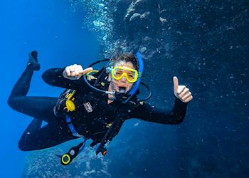 Nina scuba diving on the Great Barrier Reef