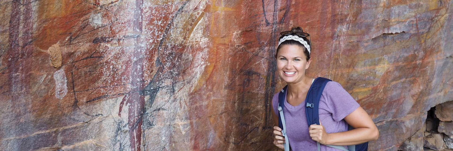 Rachele viewing ancient rock art in Arnhem Land, Northern Territory