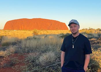 Sam visiting Uluru, Australia